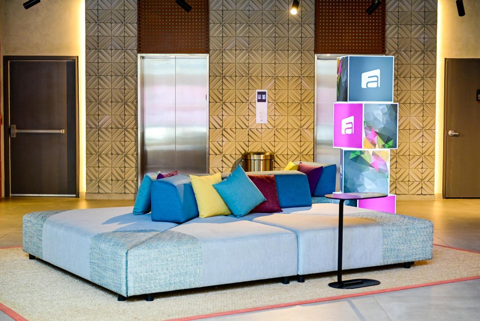 Aloft Playa Del Carmen Hotel Exterior foto The lobby of the hotel